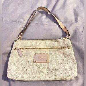 Michael Kors small clutch / wristlet good condition